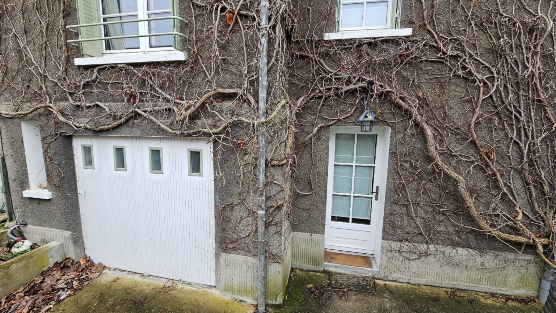 Façade avant réparation des fissures à Saint-Brice-sous-Forêt, état d'origine - Raval d'Oise